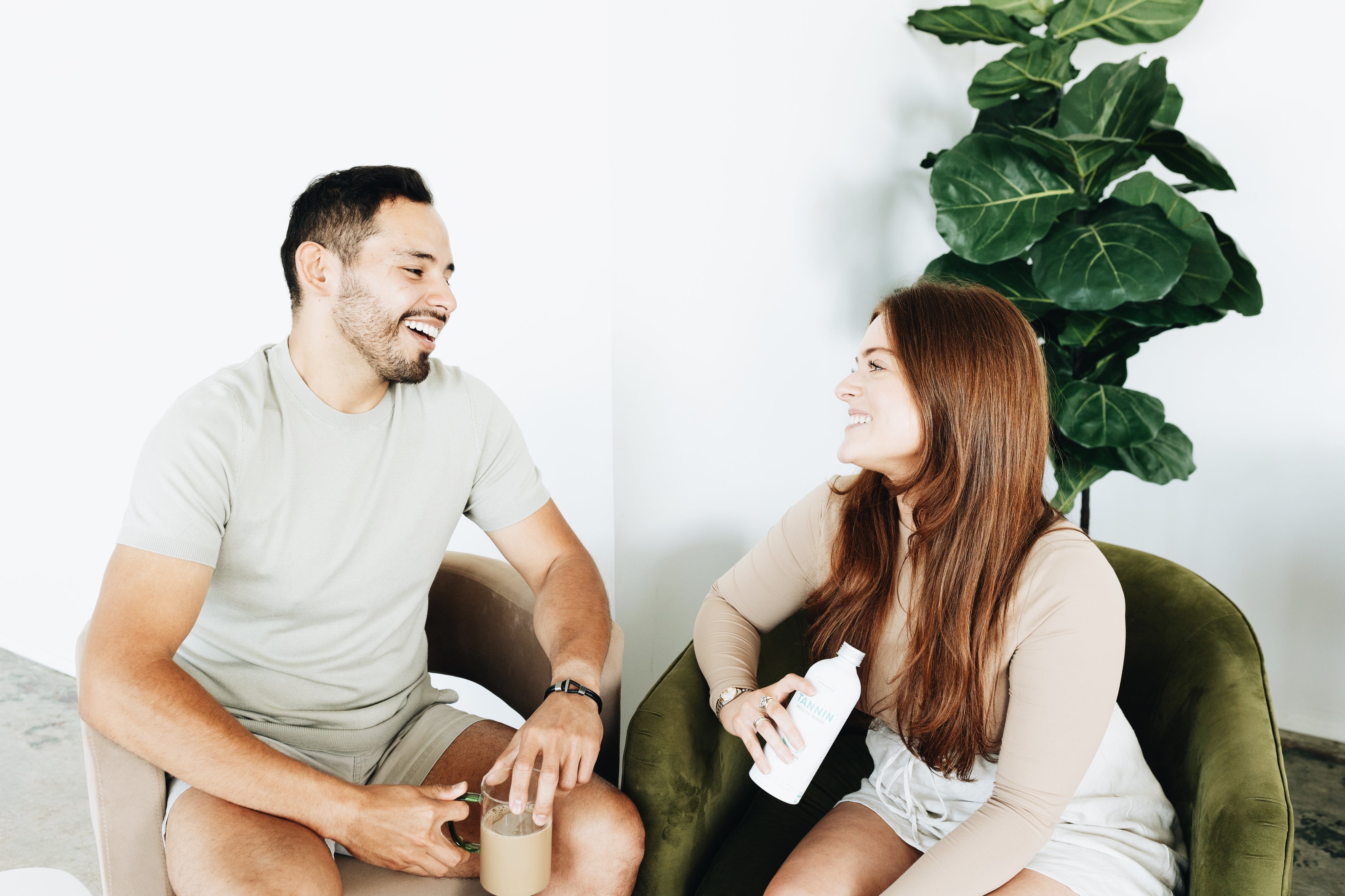 A smiling man and woman engaging in a warm conversation, representing the importance of social connection. The quote reads, '1 in 2 adults in America struggle with loneliness. To really address it, we have to make social connection a priority in our lives and in society more broadly.' — Dr. Vivek Murthy, U.S. Surgeon General.